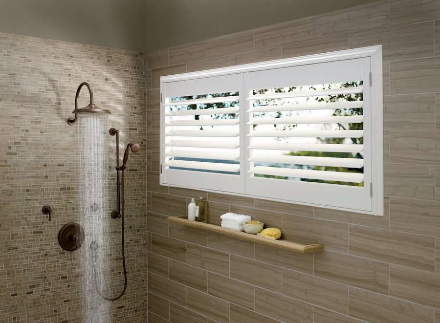 Bathroom window with Hunter Douglas Palm Beach Shutters
