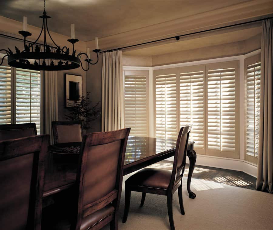 Dining room in Normandy Park, WA with hardwood shutters