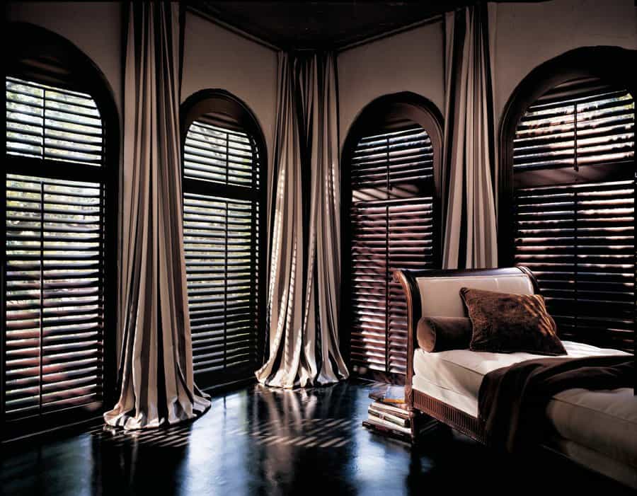 Master bedroom in Maple Valley, WA with hardwood shutters