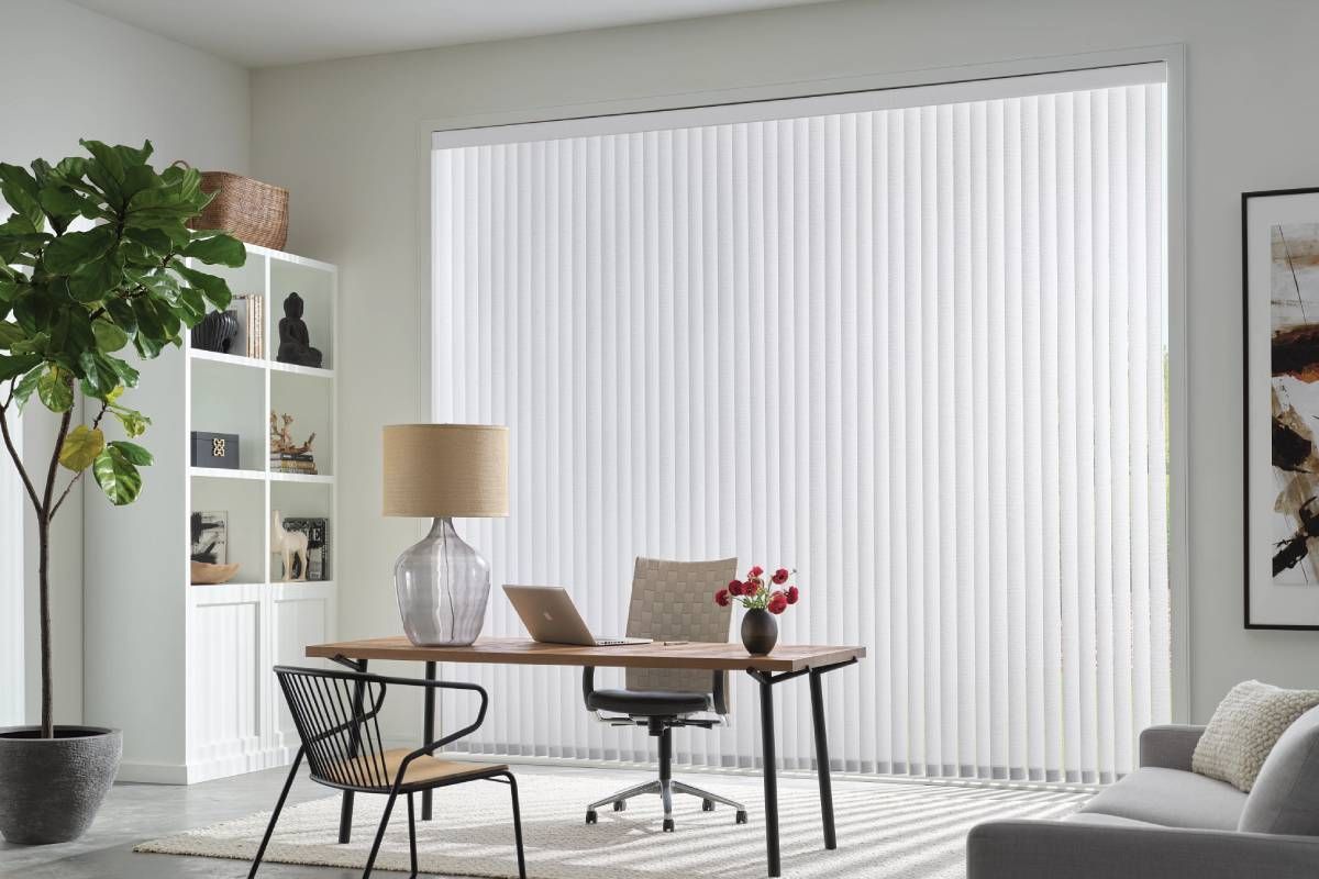 Hunter Douglas Vertical Solutions® Vertical Blinds hanging in the window of  an office space near Kent, WA