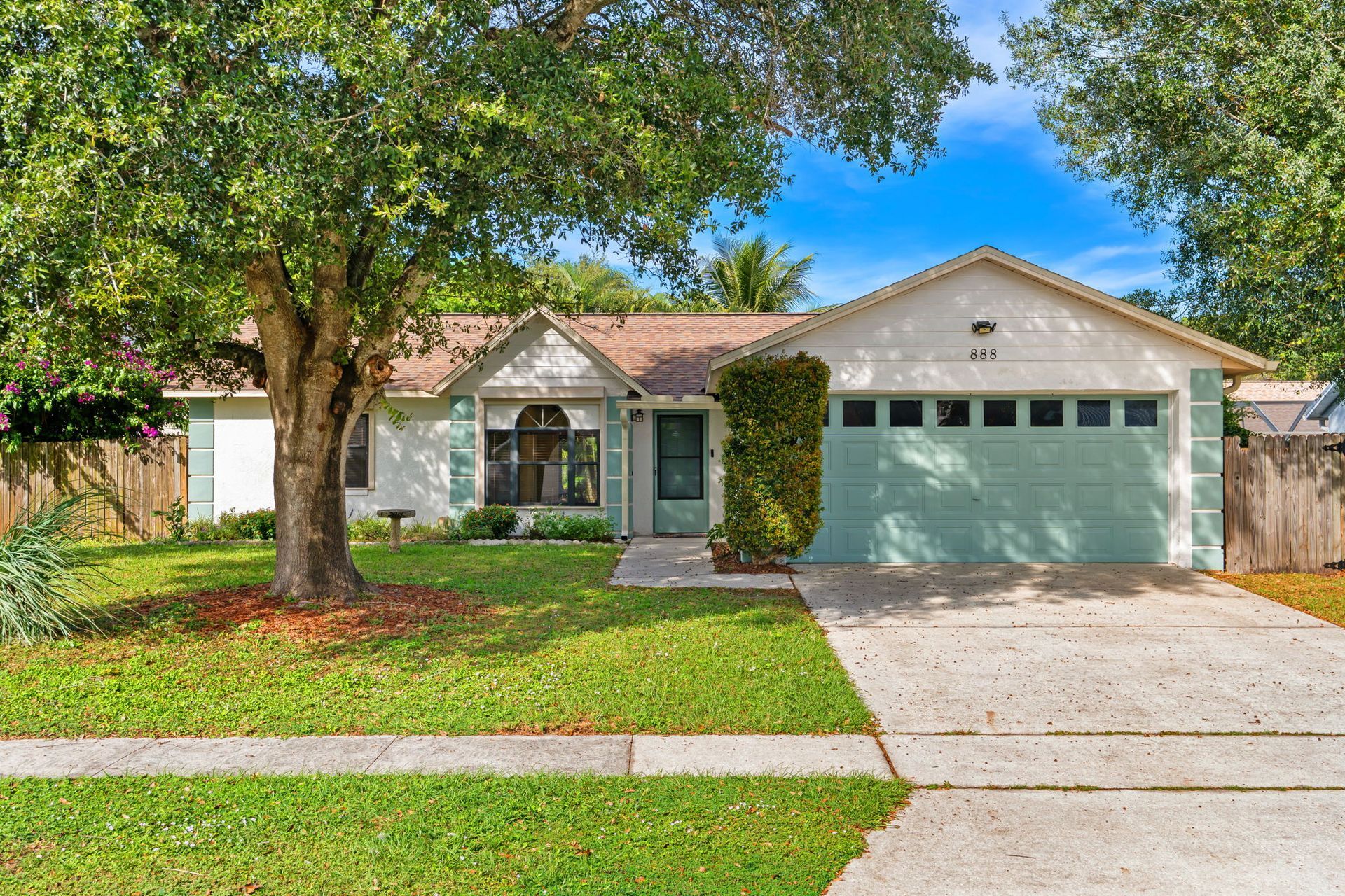 Rockledge FL home with new roof, tropical fenced backyard, fruit trees and no HOA, 3-bed 2-bath, mov