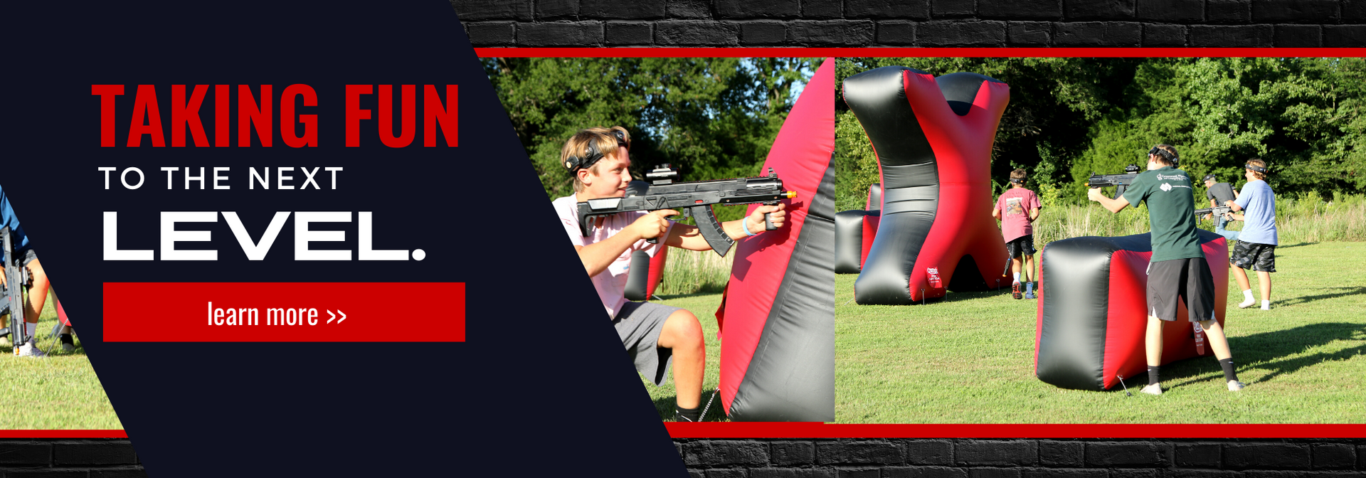 Outdoor red-and-black inflatable obstacle course with people playing; text: “Taking fun to the next level.”
