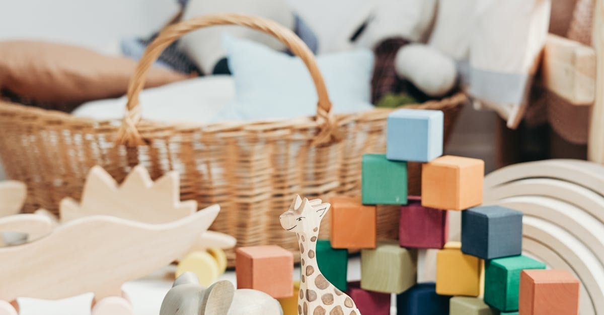 A basket filled with toys and blocks is sitting on a table.
