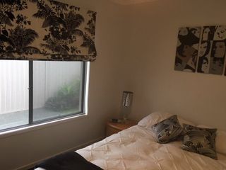 printed roman blinds in bedroom