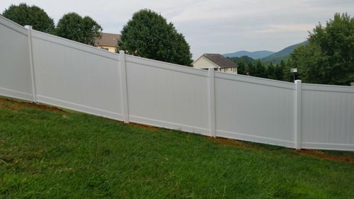 Cyclone Fence Repair and Installation — White Wooden Fence Angle 3 in Salem, VA