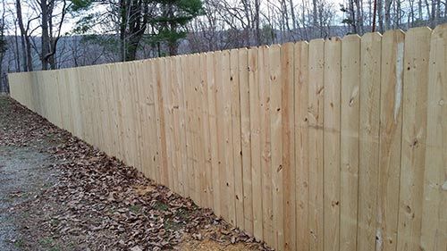 Cyclone Iron Gate Repair — Long Wooden Fence in Salem, VA