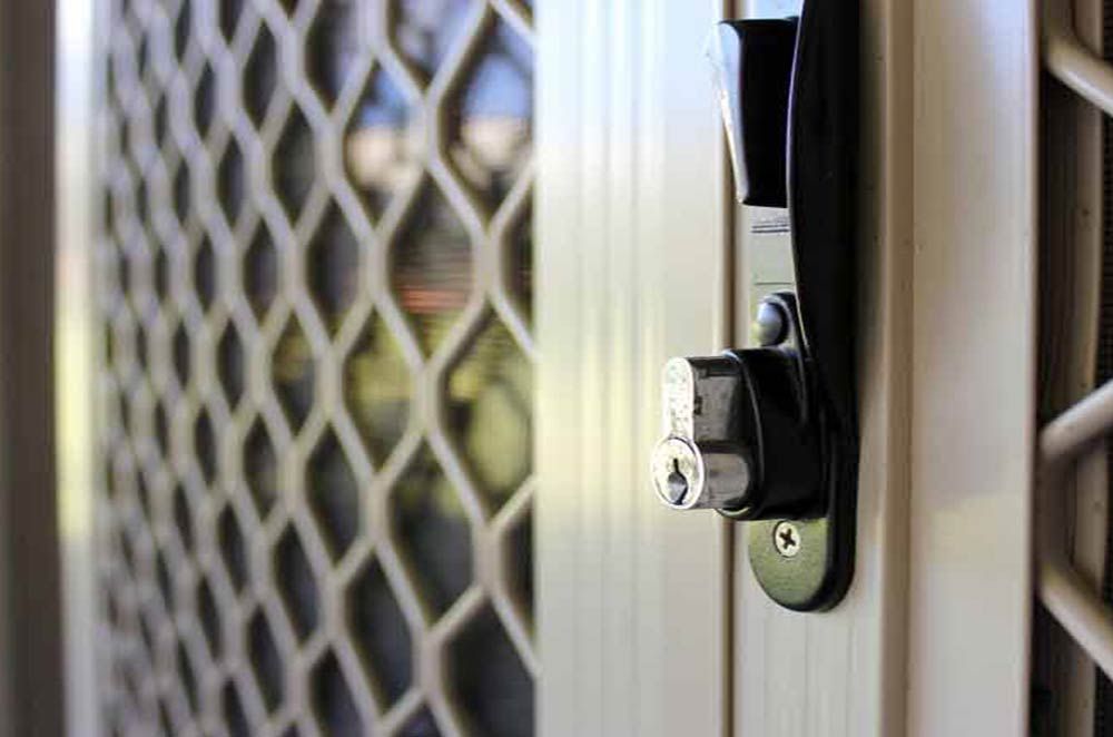 A Close Up Of A Door With A Key In It — Cape Byron Glass In Byron Bay, NSW