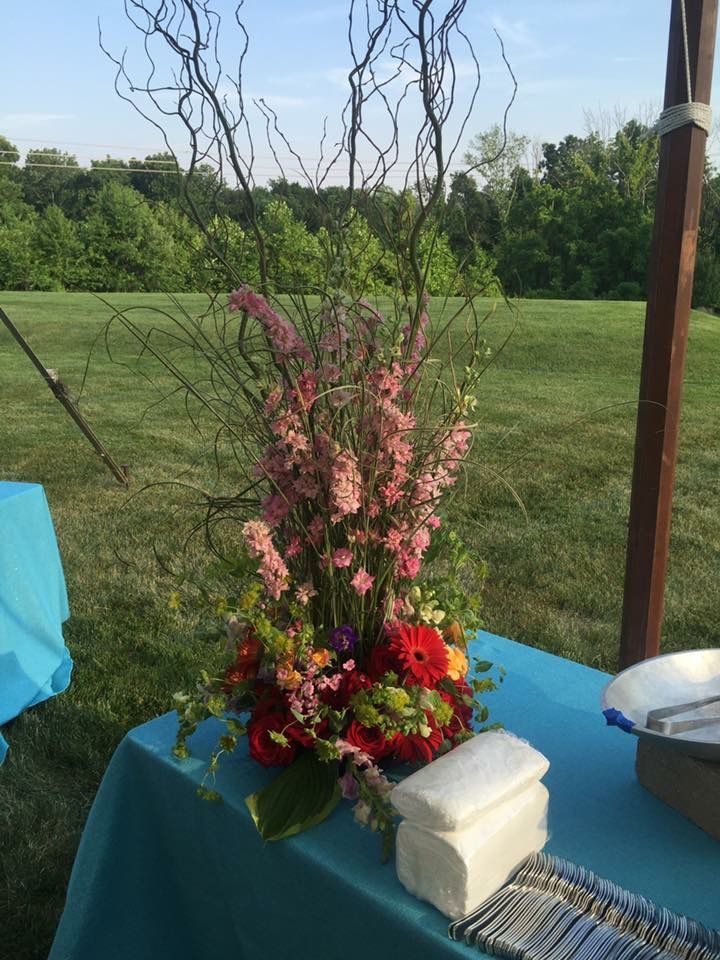 A table with a bunch of flowers on it