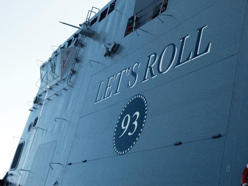The side of a ship that says let 's roll 93