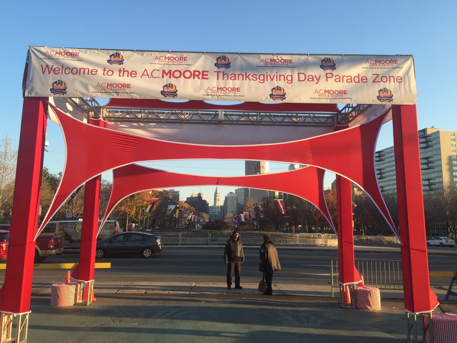 A sign that says welcome in the acmoore thanksgiving day parade zone