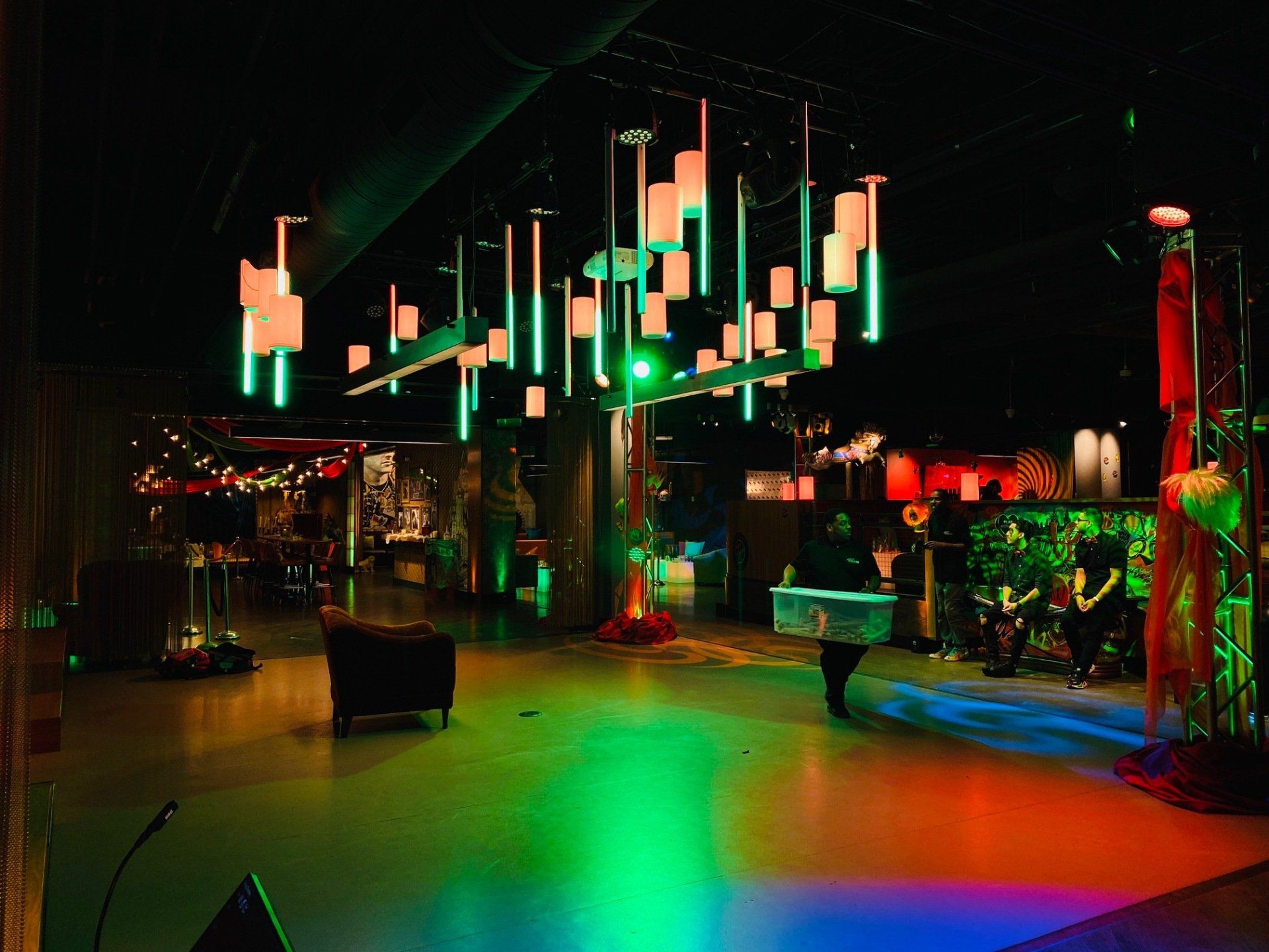 A large room with a lot of lights on the ceiling.