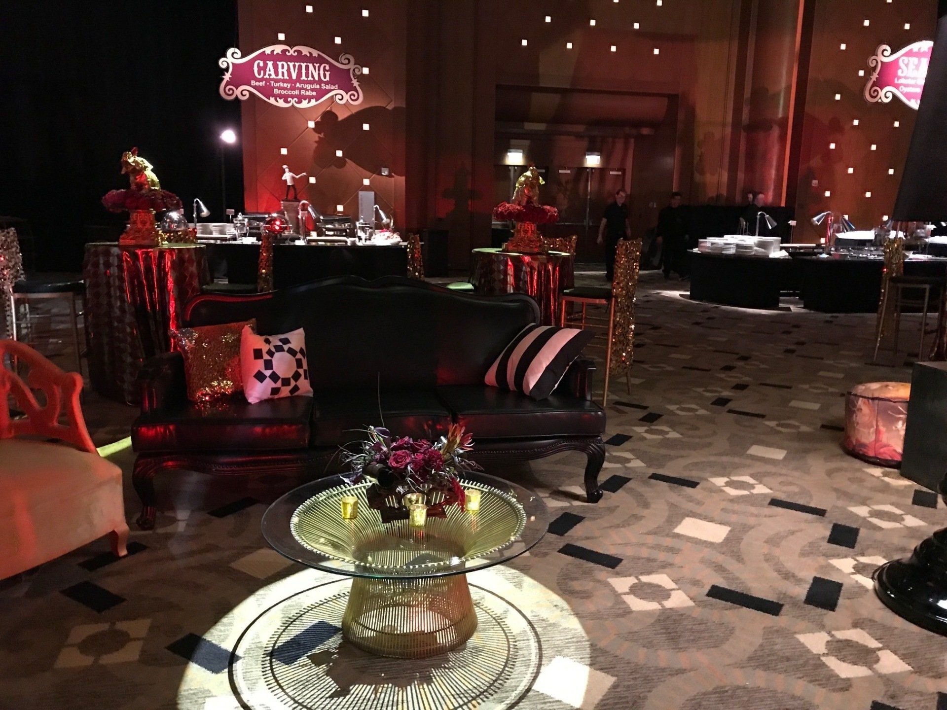 A room filled with furniture and a glass table.