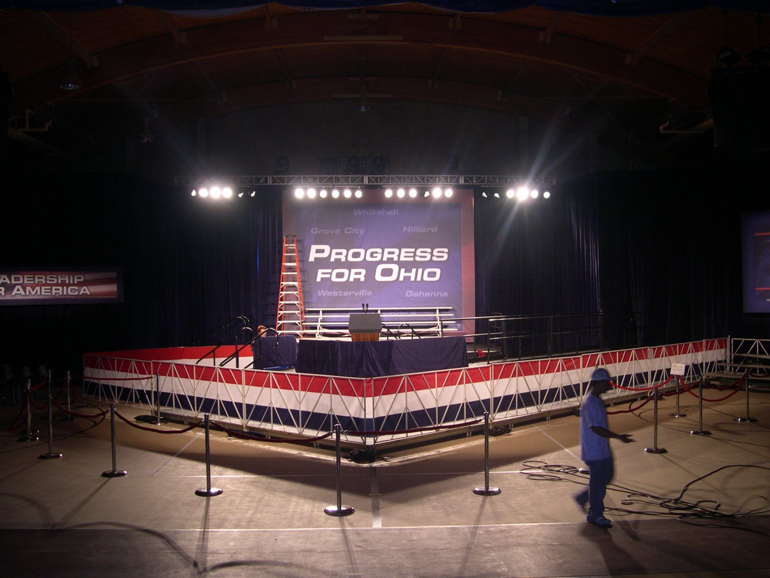 A stage with a screen that says progress for ohio