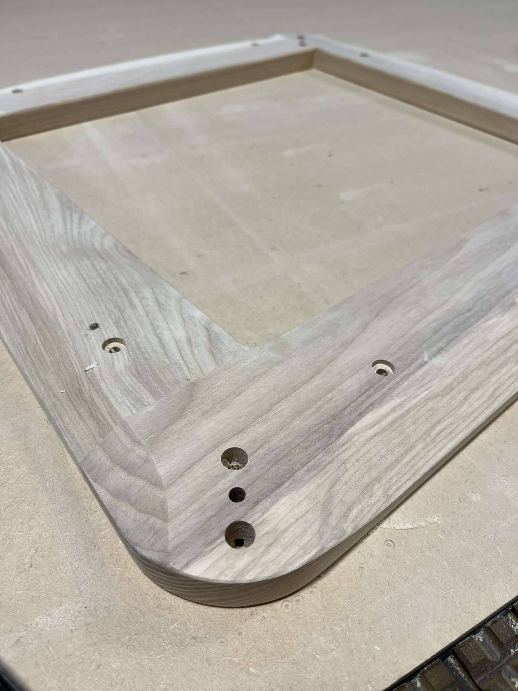 A piece of wood is sitting on top of a table.