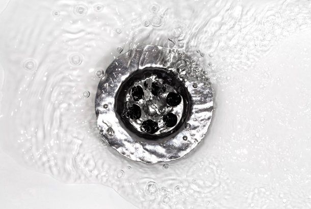 Drain Cleaning — Water Flows Into A Sink in Fort Myers, FL