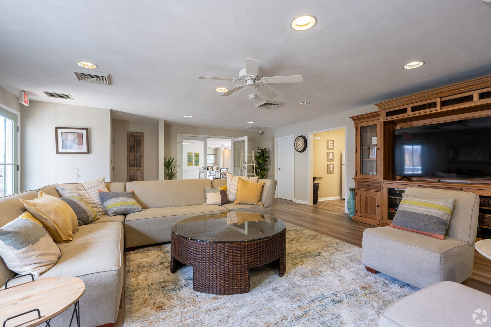 A living room filled with furniture and a flat screen tv.