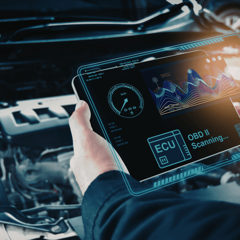 A mechanic doing a vehicle diagnostic
