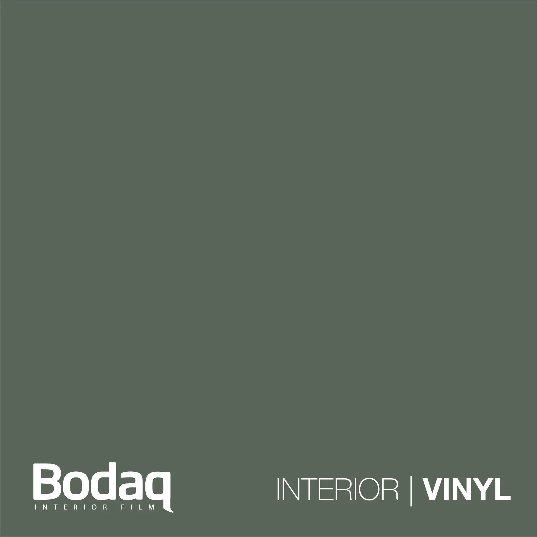 Een vierkant staaltje van donkergroene, gedempt groene vinylfolie voor interieurtoepassingen van Bodaq.