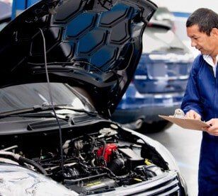 Mechanic Conducting Inspection — Car Maintenance in Easton, PA