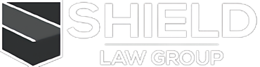 The logo for the shield law group is a black and white logo with a shield on it.
