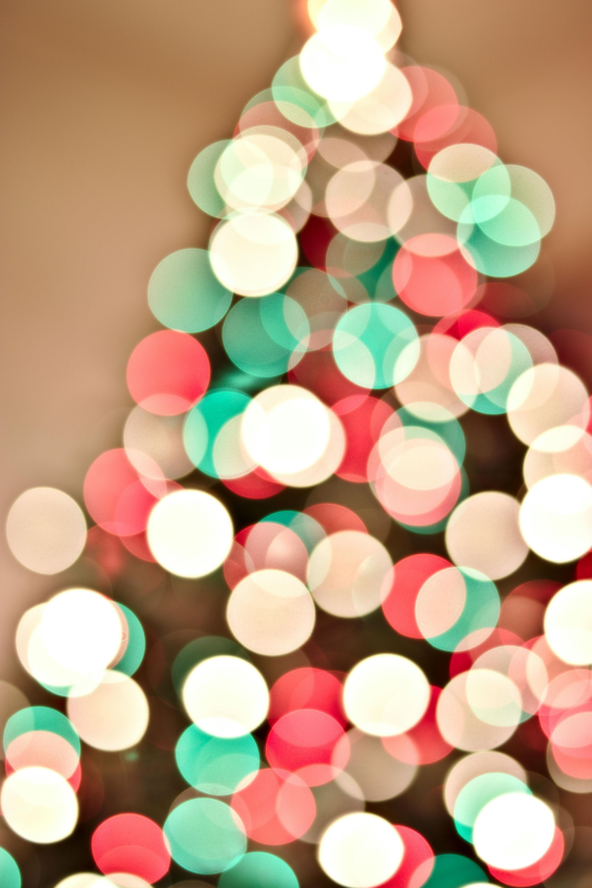 A blurry picture of a christmas tree made of lights