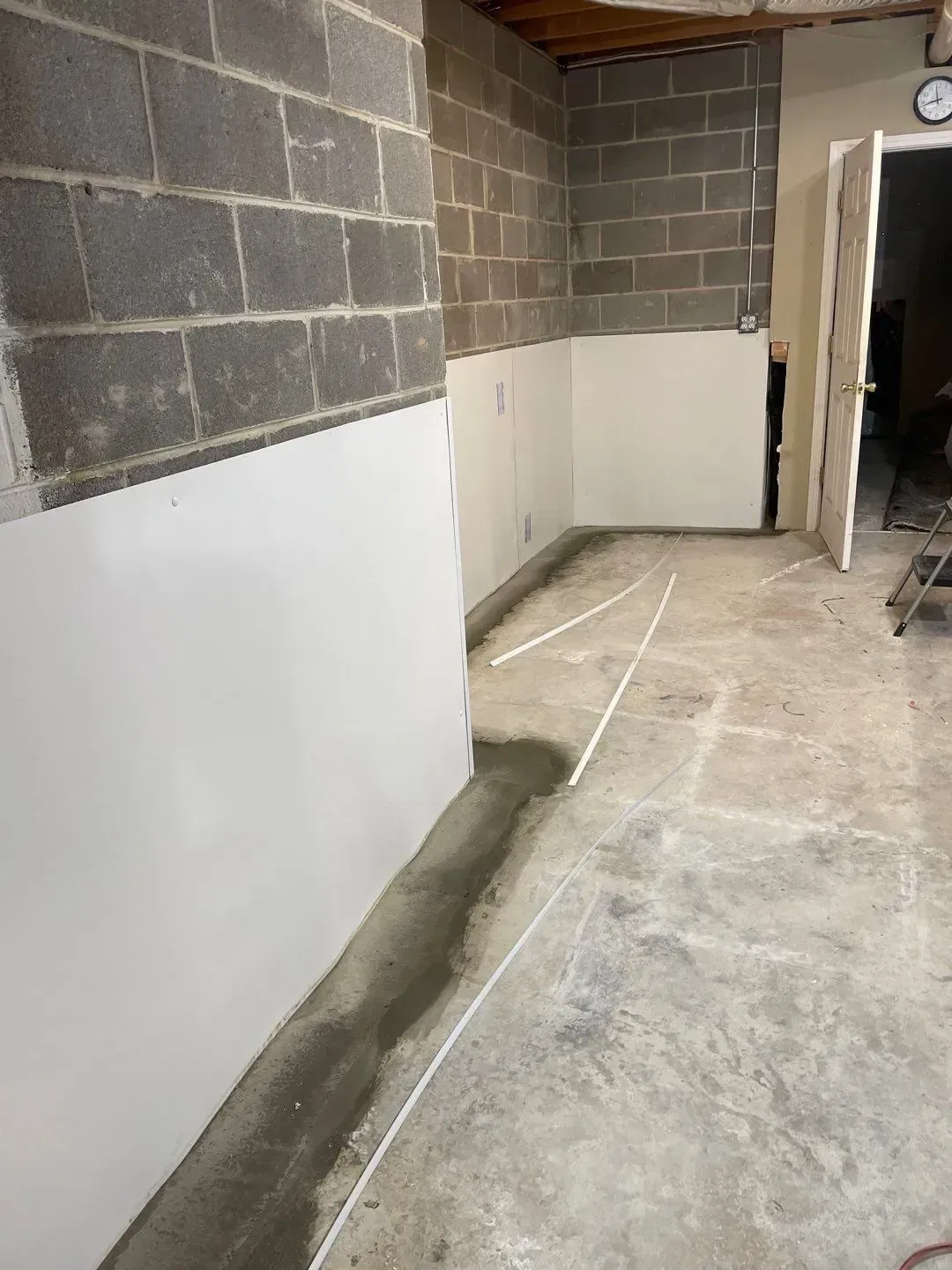 Completed basement waterproofing and drainage project in Gardendale Alabama by H2O Waterproofing.