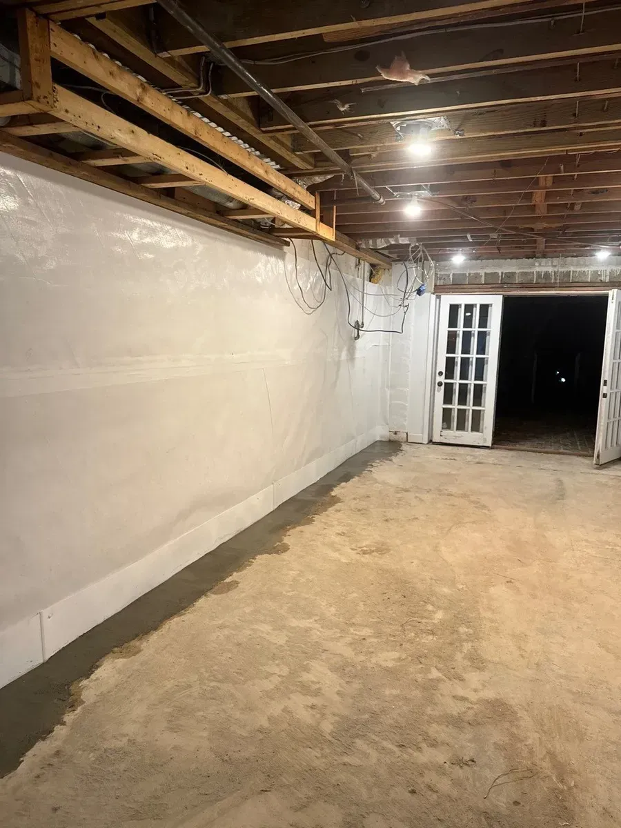 In Birmingham, AL installing H2O Basement Waterproofing System done by H2O Waterproofing