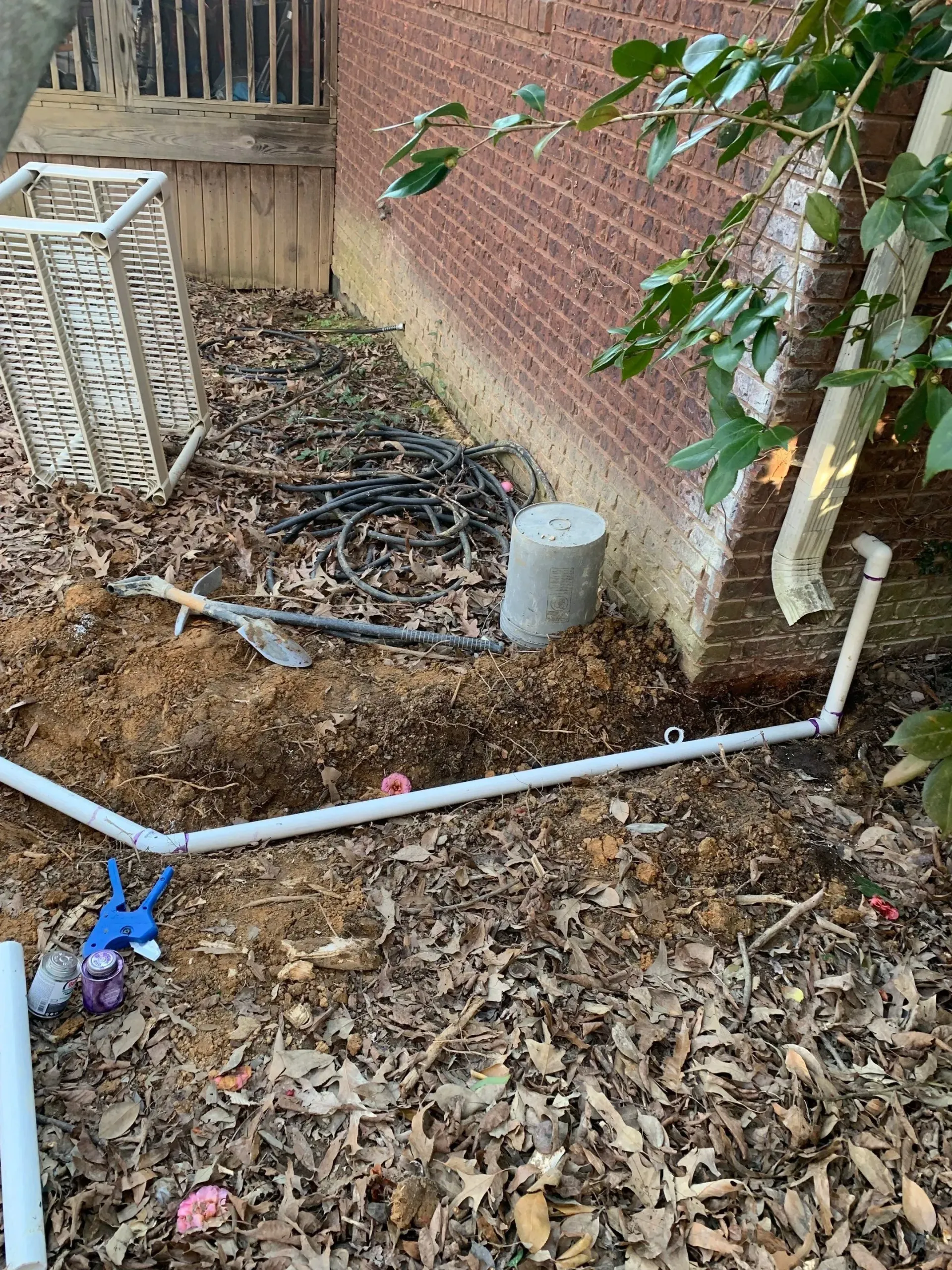 Sump pump drain discharge for basement waterproofing in Rosewood subdivision of Gardendale, AL 35071 by H2O Waterproofing