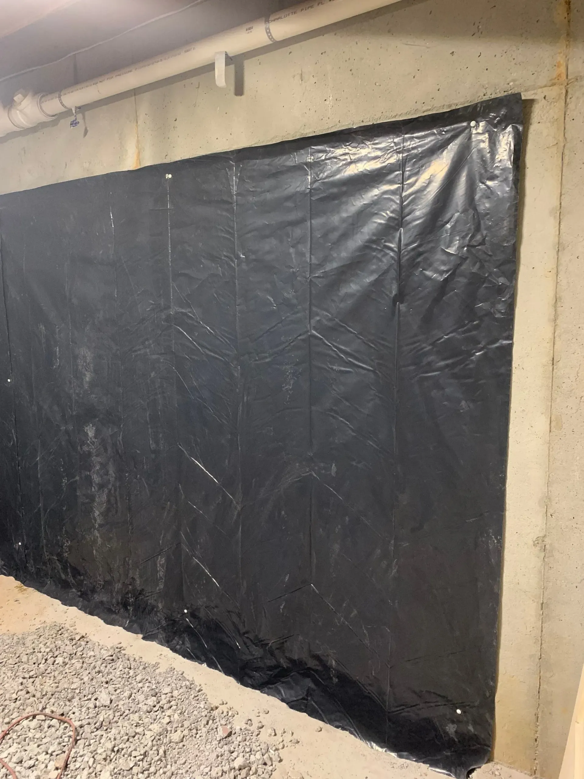 Vapor barrier installed for basement waterproofing in the Rosewood subdivision of Gardendale, AL 35071 