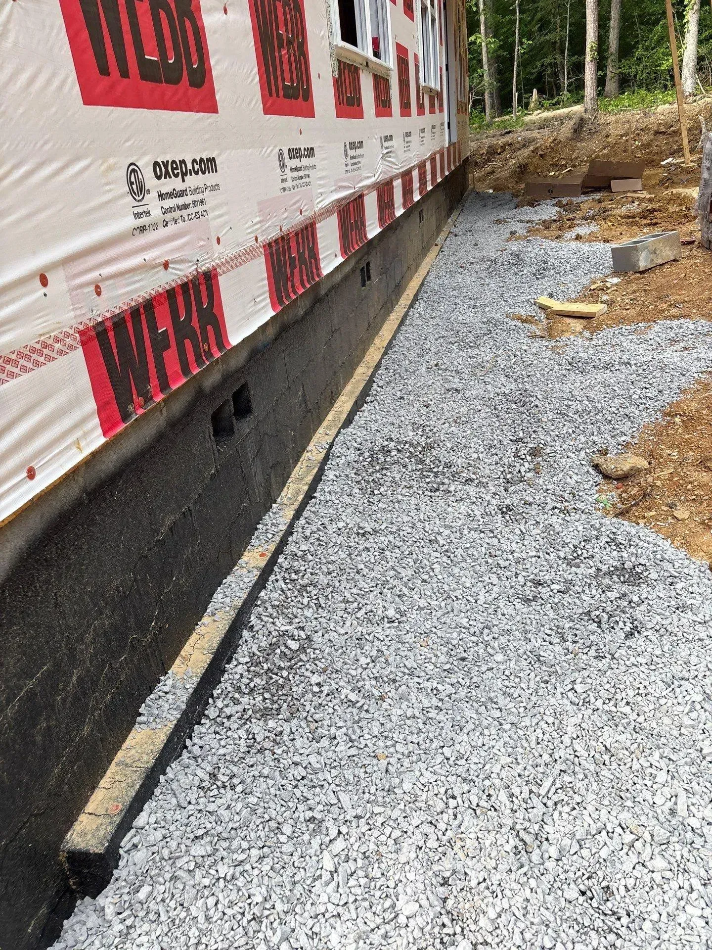 Exterior basement waterproofing in the Glen Cross subdivision of Trussville, AL 35173 . The project included moisture control, vapor barrier installation, and foundation protection to help prevent water intrusion and improve indoor air quality.