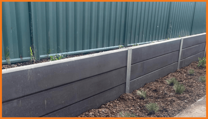 Concrete retaining wall installed in an Australian backyard