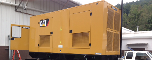 A person is installing an electrical outlet in a wall.