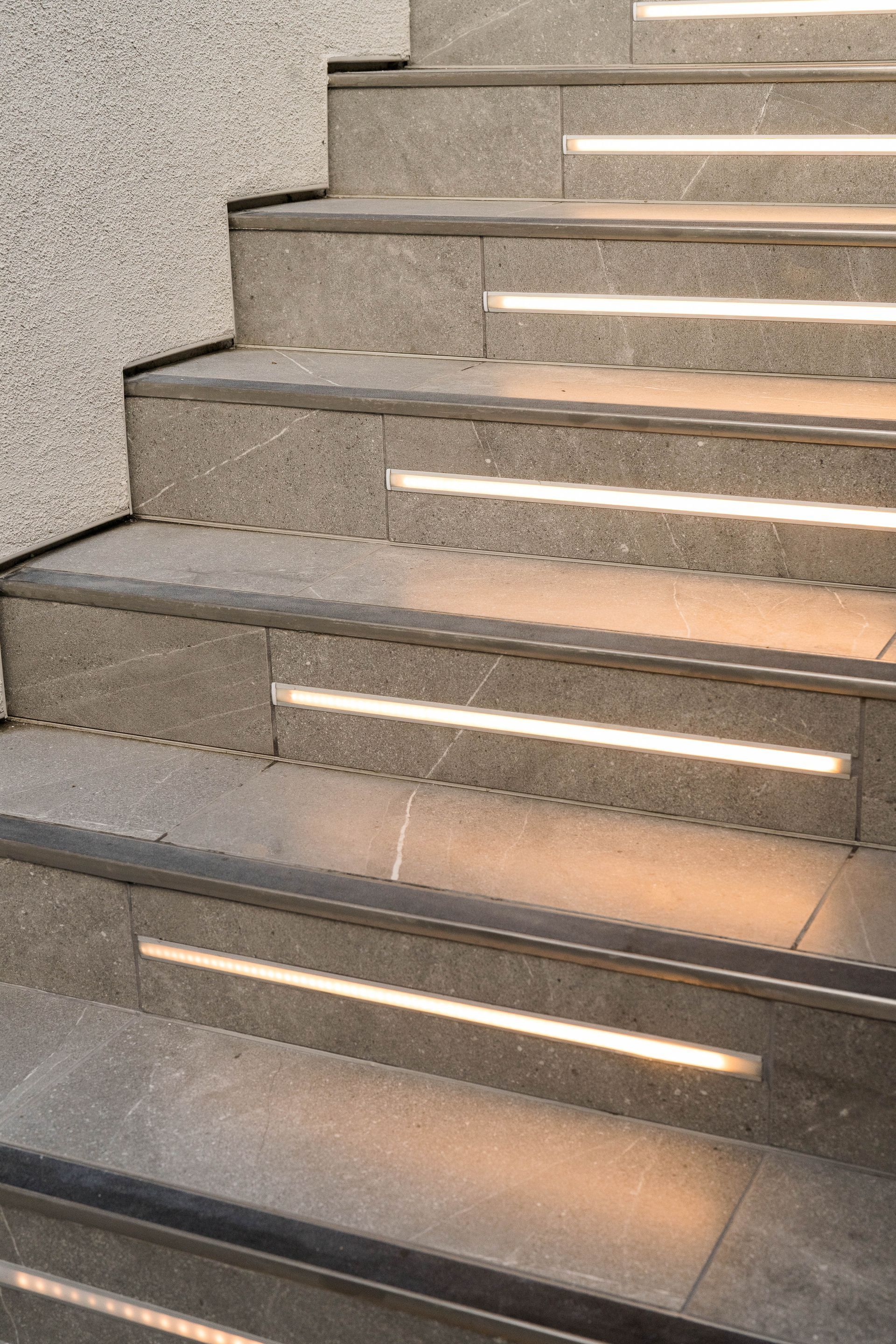 a set of stairs with lights on the steps