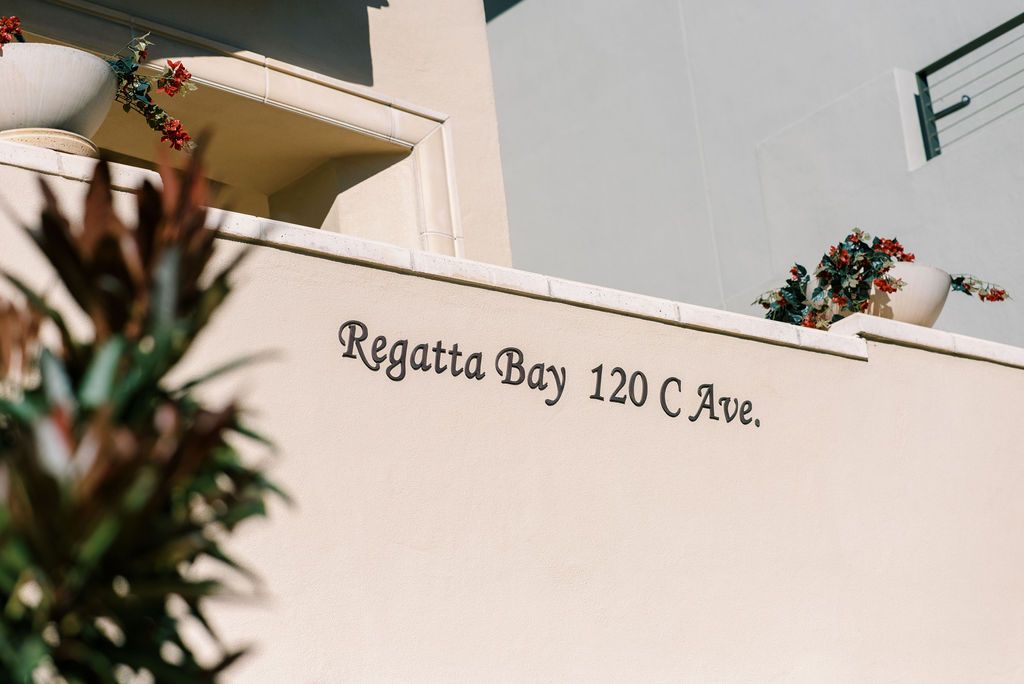regatta bay 120 c ave is written on a white wall