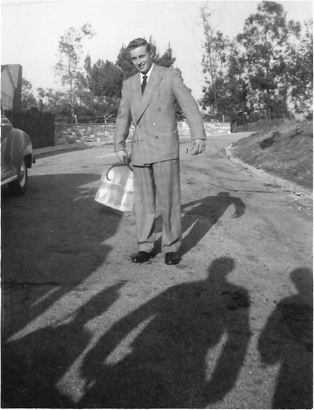Mel in Suit with Block of Ice — Acton, CA — Acton Ice and Snow
