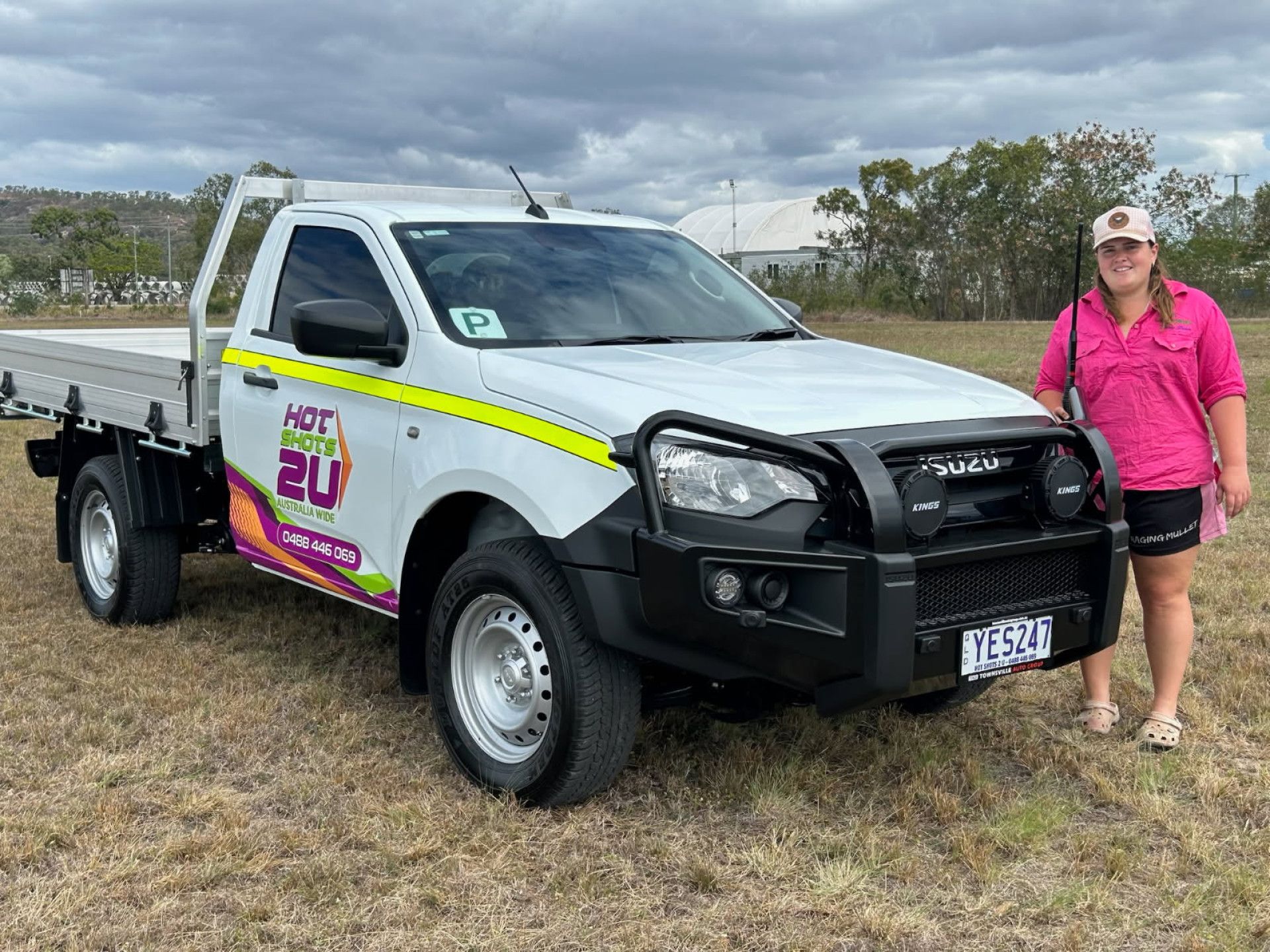 A Work Vehicle Parked on the side of the road — Hot Shots 2 U In Townsville, QLD