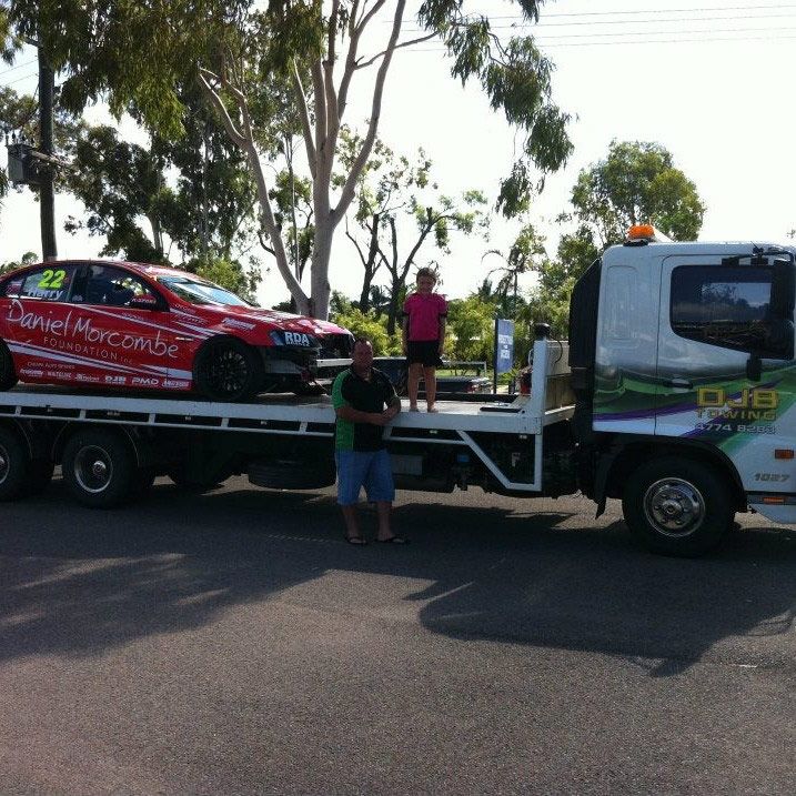 Race Car on Tow Truck, Two People Standing on the Truck — Hot Shots 2 U In Townsville, QLD