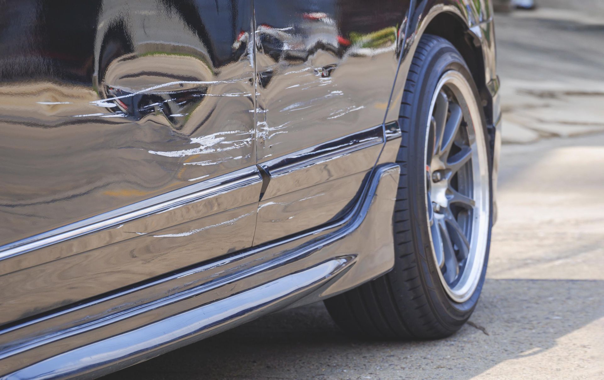 Ford Focus with scratches running down the side of the car