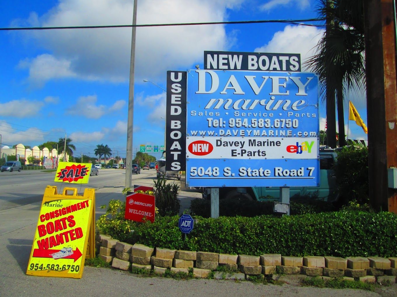 A billboard for new boats and used boats