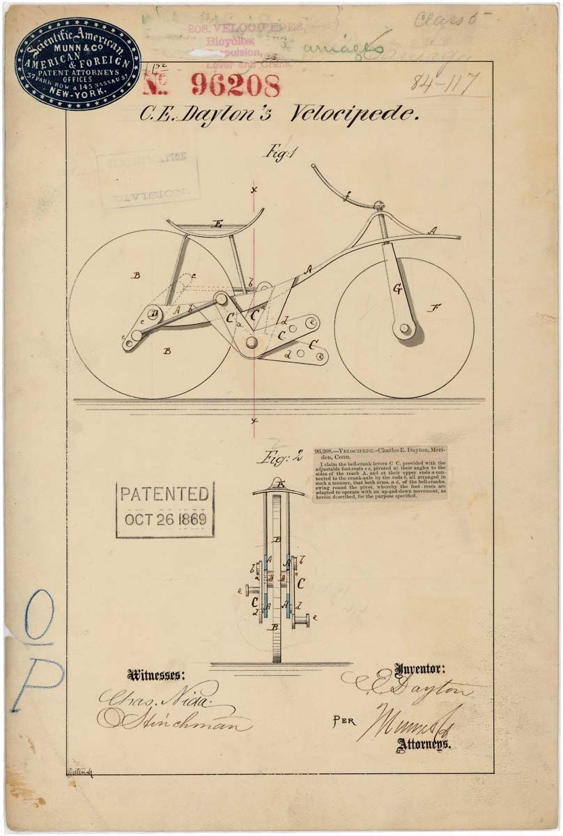 Patent drawing of a bicycle, side view. Shows the mechanism and a view of the bicycle's vertical support system.