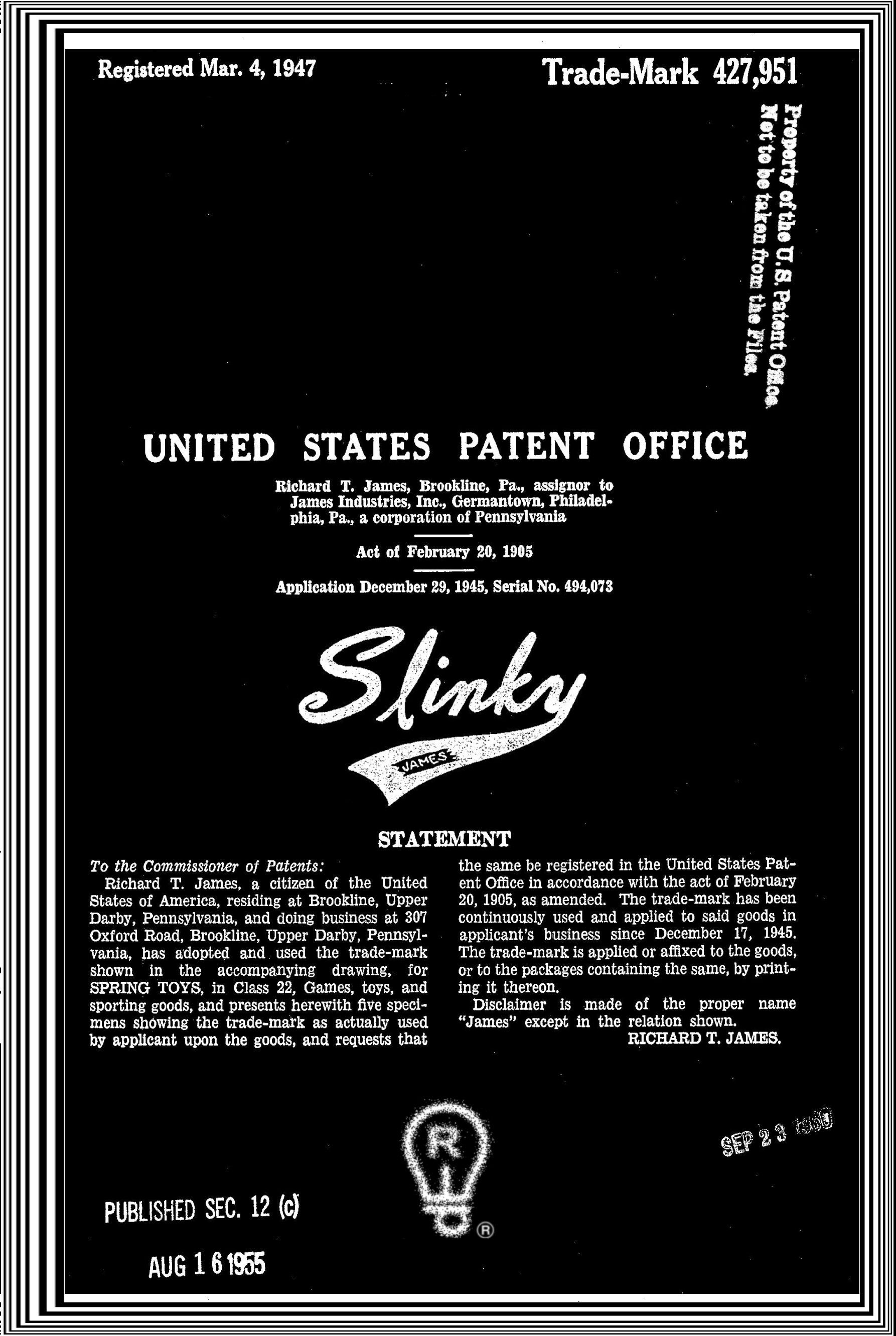 Trademark registration for Slinky toy, with text and stylized logo on a black background.