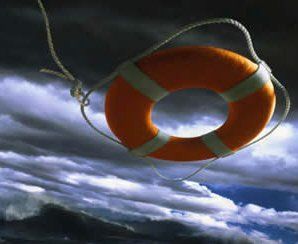 Orange life preserver floating against a stormy, dark sea.