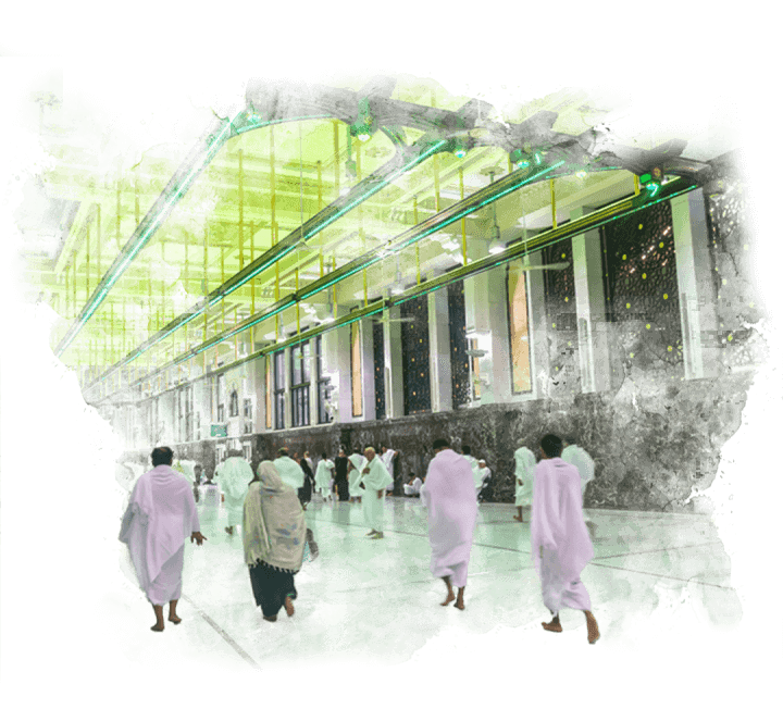 A group of people are walking in a building.