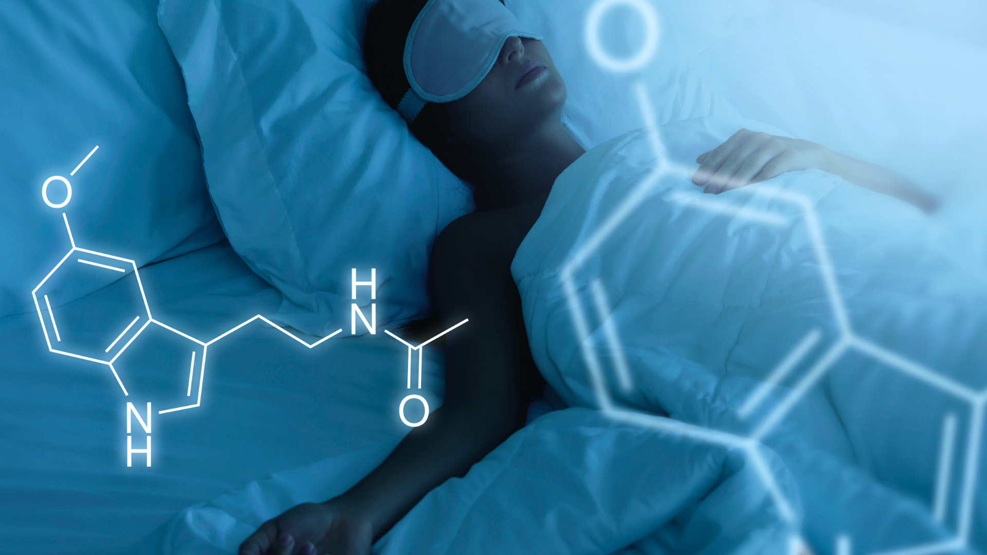 A man is sleeping in a bed with a chemical structure behind him.