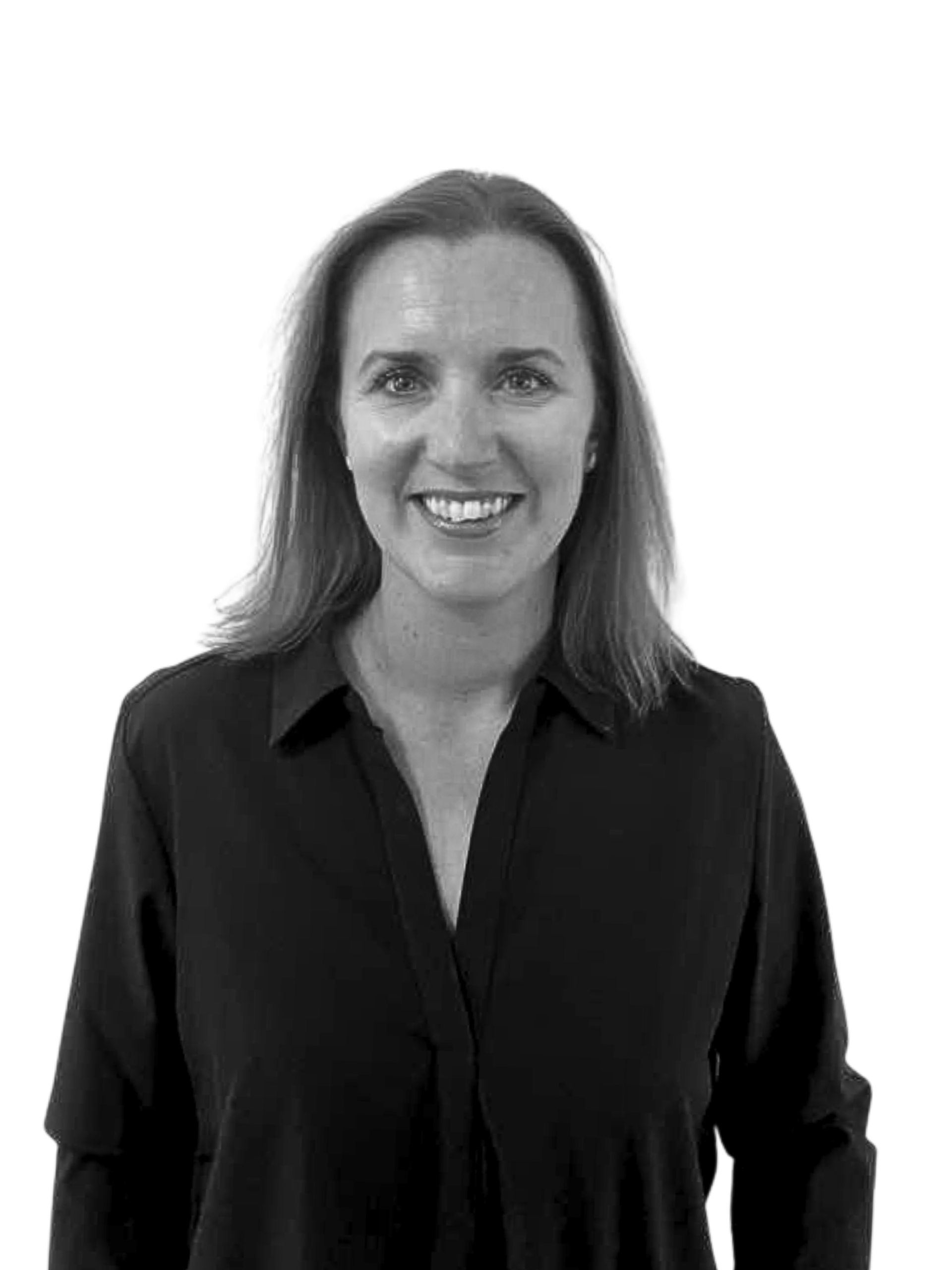 Woman with light skin smiles, wearing a black shirt, against a white background.