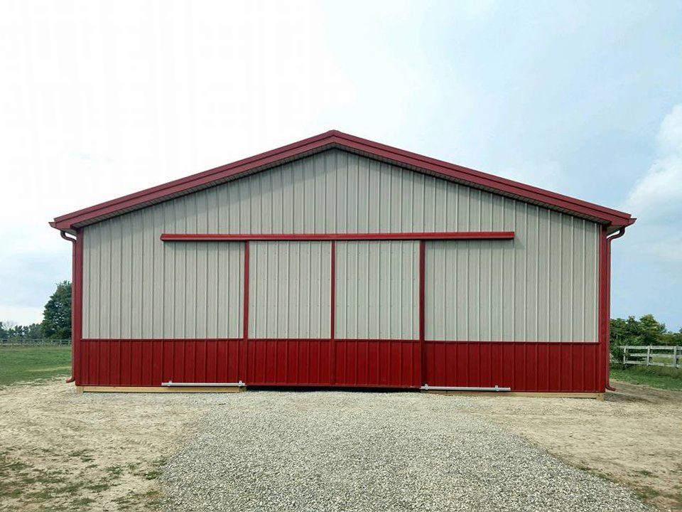 red & Tan large pole building