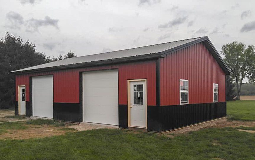 red brown garage with 3 doors
