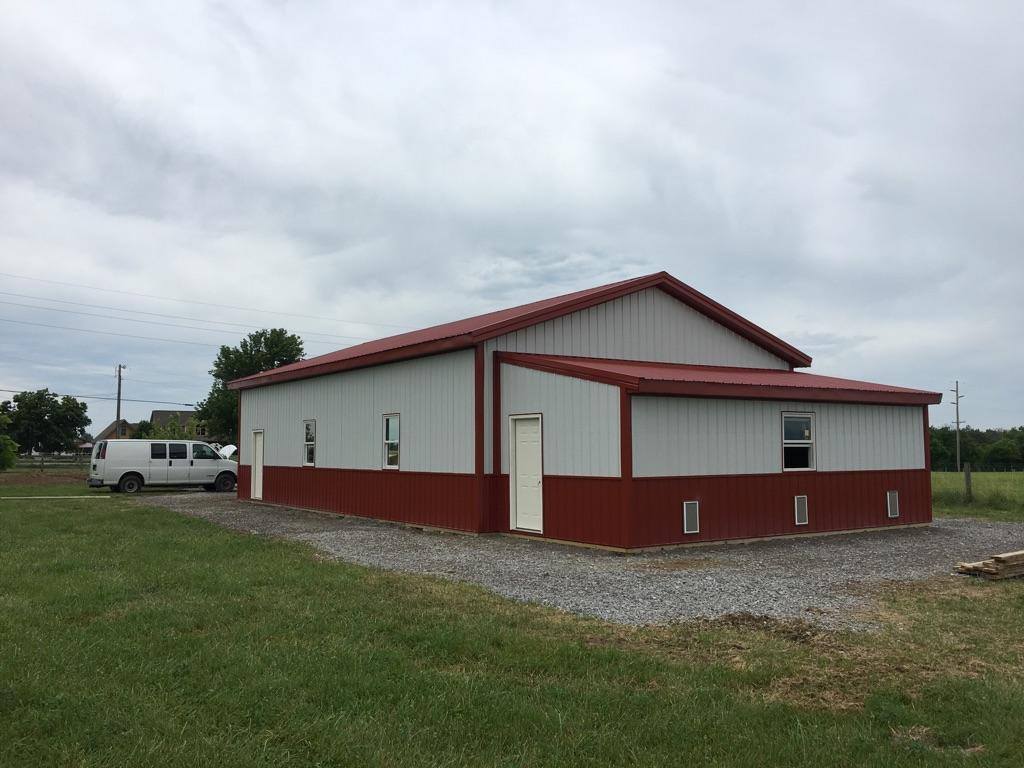 large pole building with rear equipment shed