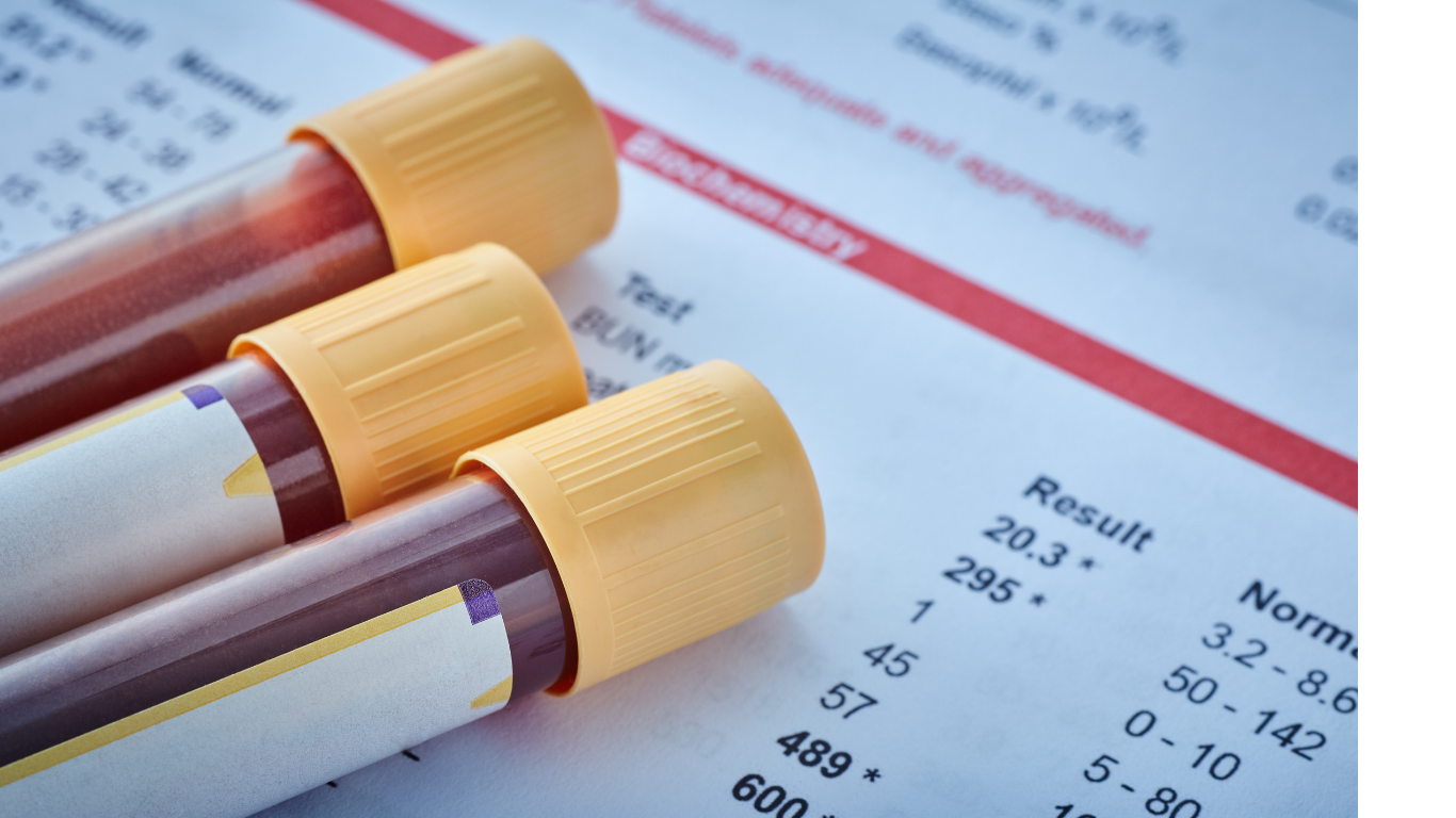 Blood sample tubes on a medical report, with visible results and normal ranges.