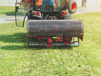 Soil Aeration Machine on Grass Lawn — Hiawatha, KS — Maple Wood Lawn Care